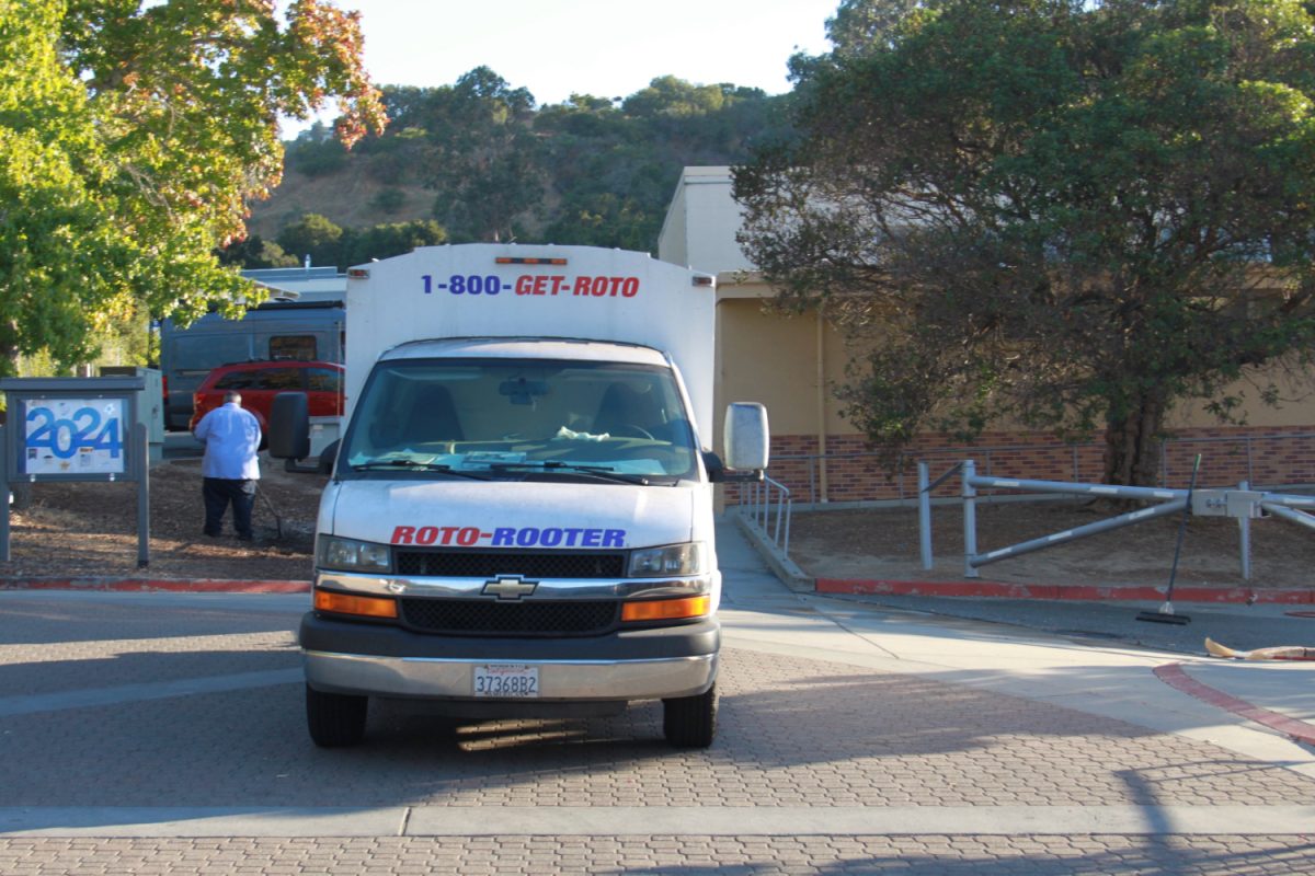 A Roto-Rooter truck arrives at Carlmont to fix the sewer clog before any leaks  can spill. The worker fixes the issue quickly, allowing people to use the S, T, U bathrooms again.