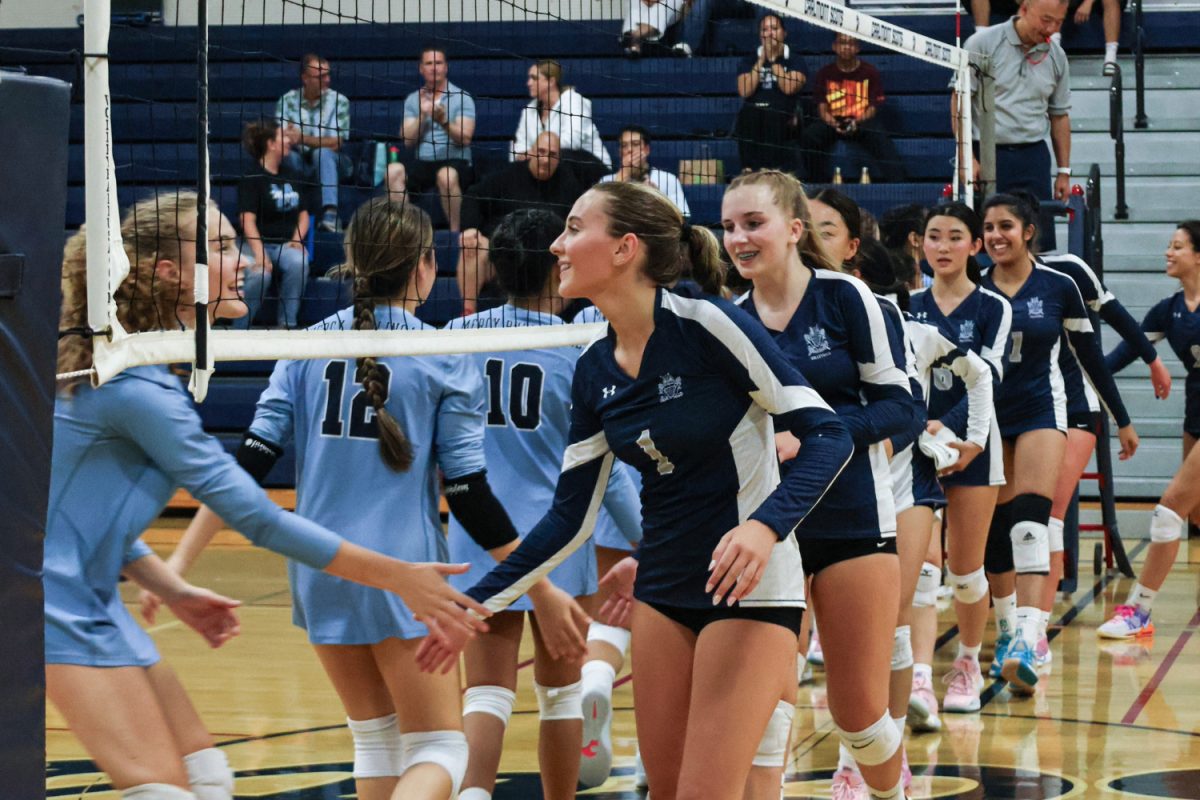 The Scots shake their opponents' hands before the match starts. Shaking hands is a way to start the game with good sportsmanship and respect among the teams. Team handshakes before a game also allow players to wish their opponents good luck.