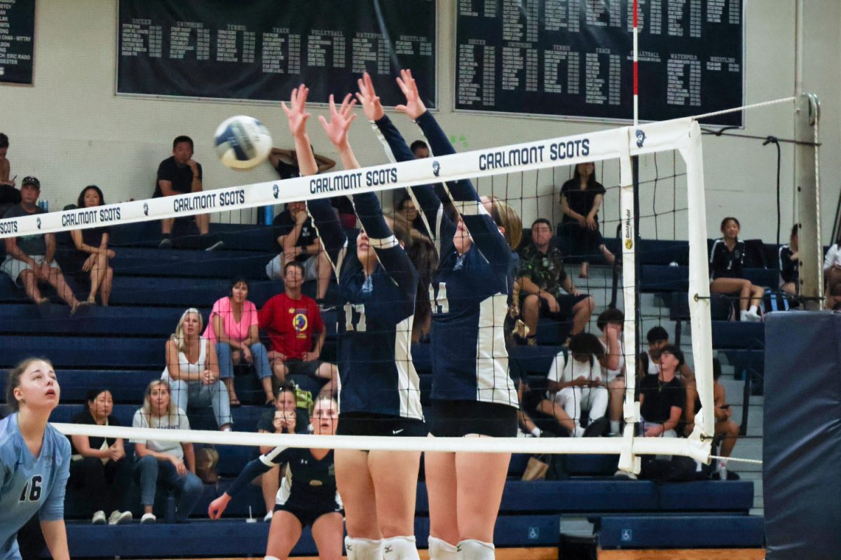 Pasion and sophomore Eva McLinden block an incoming spike from the opponent. Blocking allows teams an opportunity to put the opponent back on defense. Blocking creates a lot more complexity in the game due to how fast a team can go from an offensive position to a defensive one.