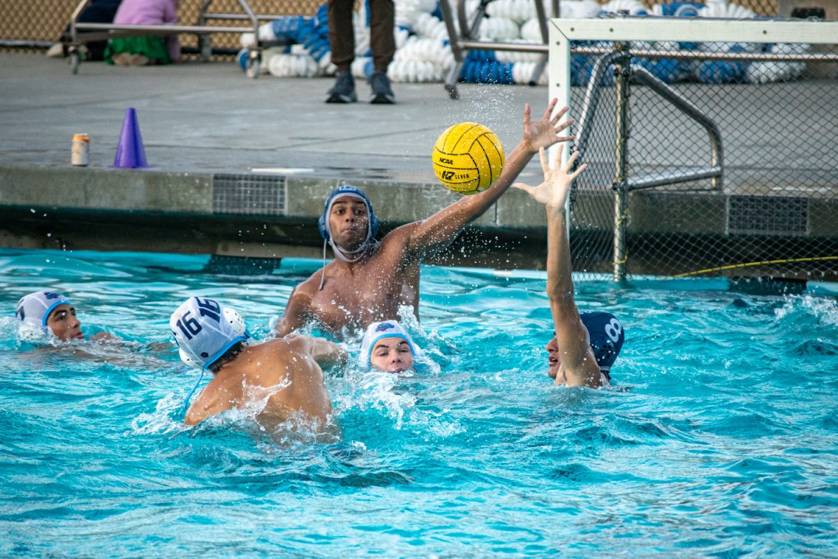 Bhatt and junior Carson Woo attempt to block a shot by Knights junior Austin Lu. The Knights got very close to scoring, with some players being right by the goalpost. Due to the Scots' defense, however, the Scots switched up on offense after they blocked and received the ball.