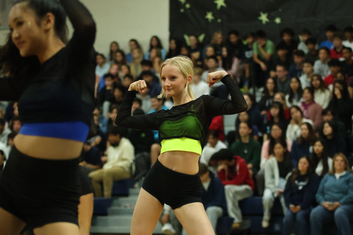 A member of the Carlmont Advanced Dance program strikes a pose as part of the class's prepared piece.