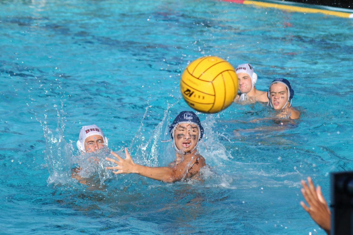 Sophomore Alexander Xu watches as a Burlingame player’s shot soars left of the goal. Xu made many offensive and defensive contributions to help the Scots earn a 10-4 victory over the Panthers.