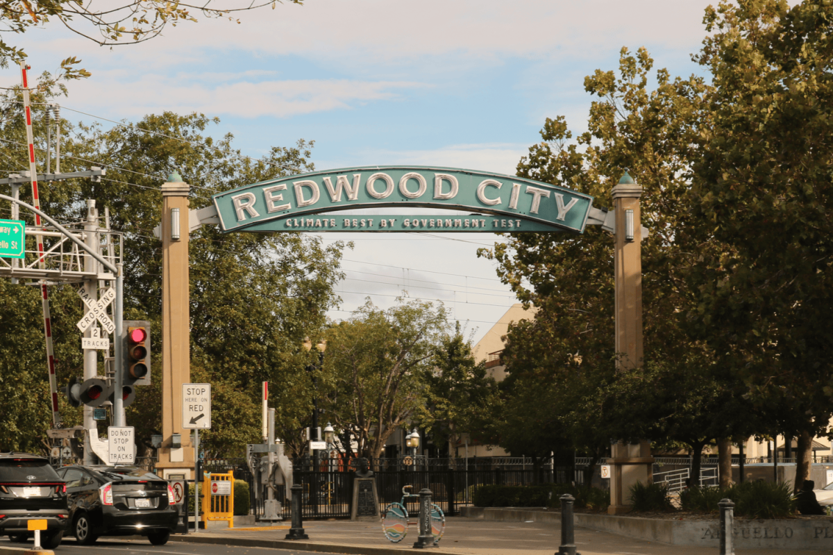 The iconic Redwood City sign stands proudly on Broadway. This sign, seen in many areas across downtown, features the slogan "Climate Best by Government Test," created in 1925 during a contest to sum up Redwood City's charms in a slogan. One of the contest organizers claimed there are only three areas in the world with perfect weather: the Canary Islands, North Africa's Mediterranean Coast, and Redwood City, and a government test backed it up. He ended up winning the contest. 