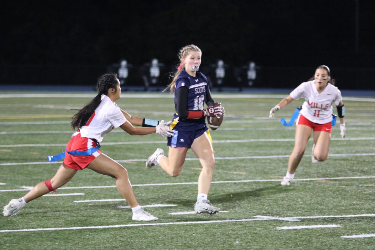 Lauren Greene whizzes past the defender for the large gain. The junior quarterback had a focused mindset coming into the game ready to score. "My mindset was definitely to get as many points up," Greene said.