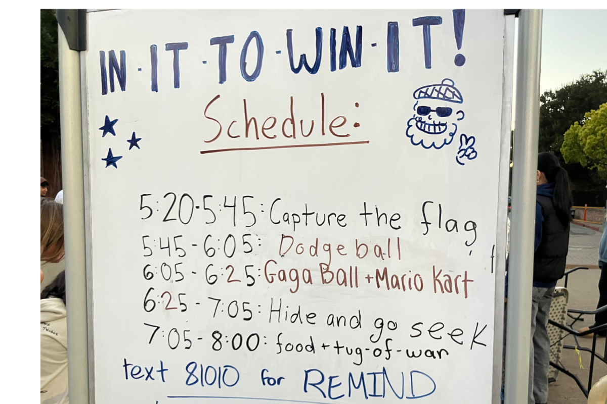 A whiteboard displays the schedule for the "In it to Win It" competitions. This activity took place after school on Thursday evening.