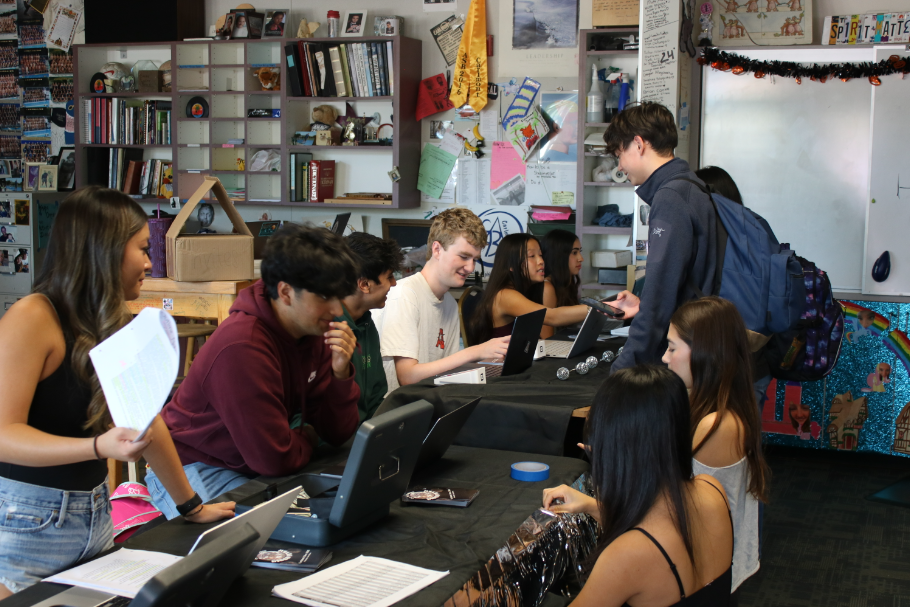 ASB students assist Carlmont students in buying disco homecoming tickets. "Our job is to provide a lot of different activities, and therefore, for ones like homecoming, students will feel a little bit more comfortable participating in a dance," said Jim Kelly, Carlmont's Activities Director.