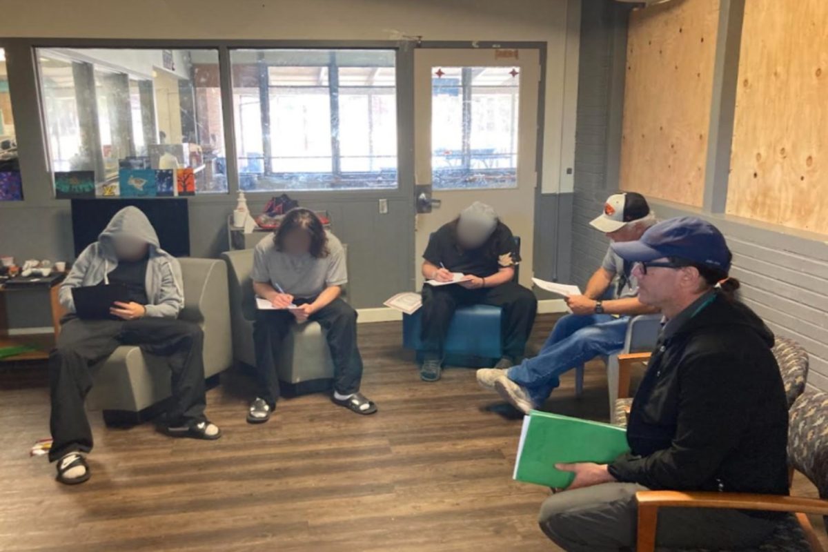 Johnny Kovatch guides a group of students in a juvenile hall facility in creative writing exercises. Photo courtesy of Johnny Kovatch. 