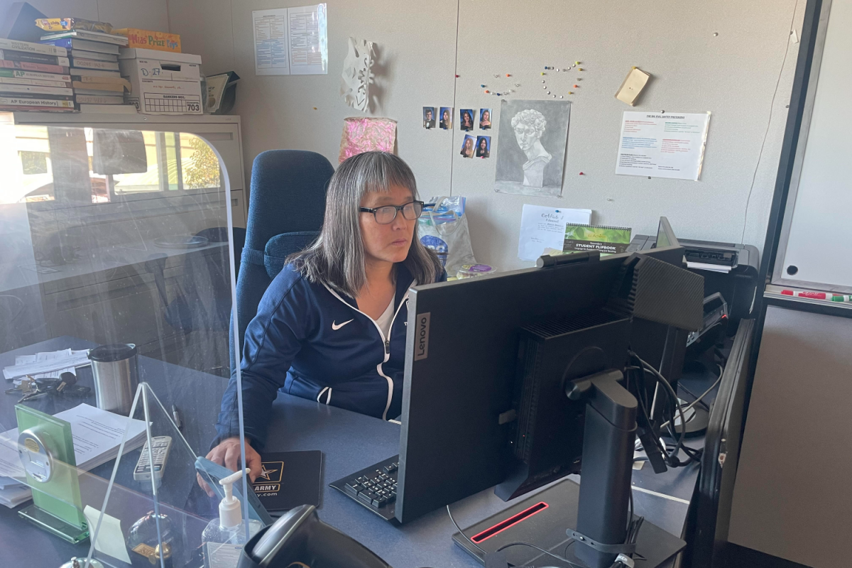 Patricia Braunstein works at her desk developing curriculum. "Mrs. Braunstein is always fun, and I think that makes the material enjoyable and easier to understand," Zinzuvadia said.