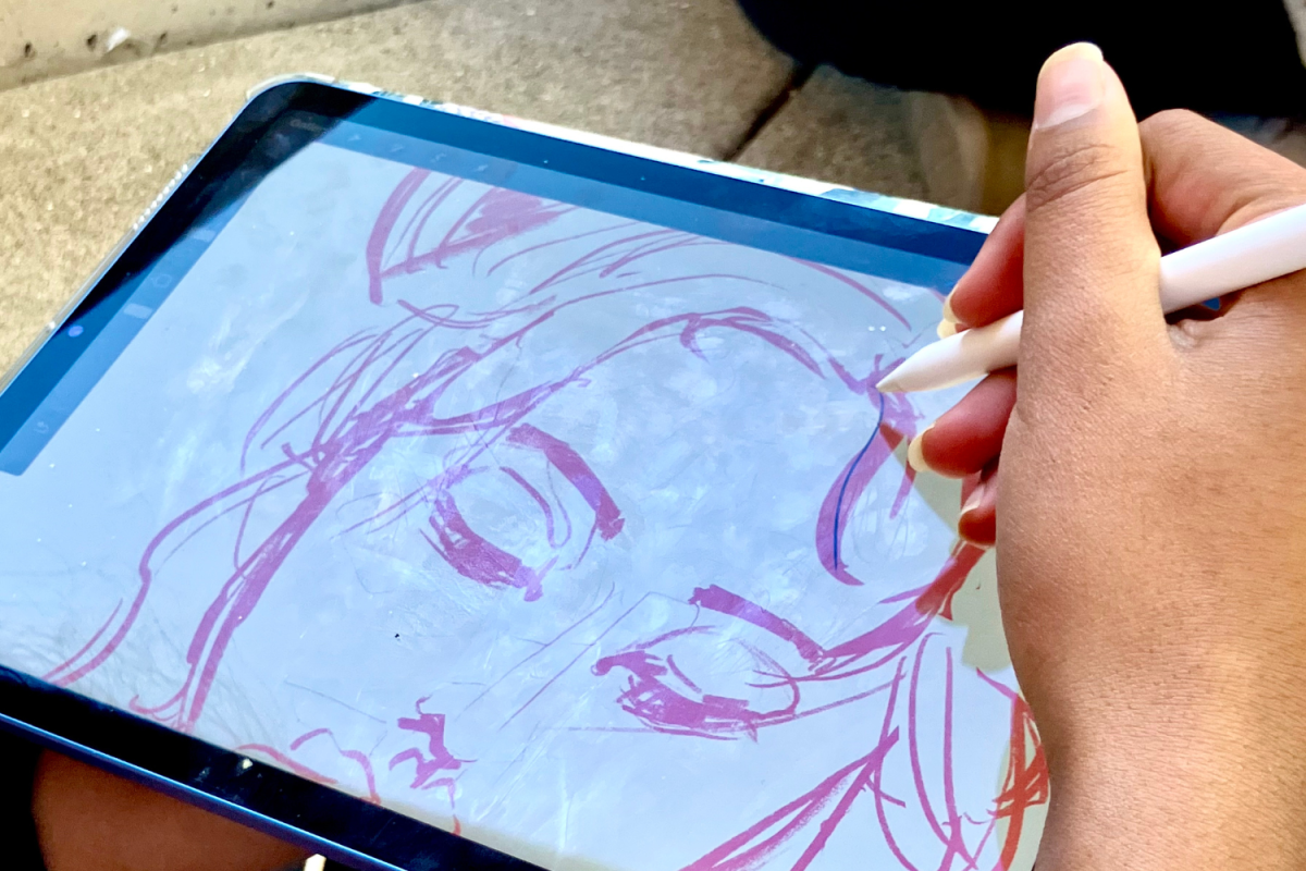 A participant in this year's contest works on her next project. Digital art is just one of many mediums that can be used to create and express.