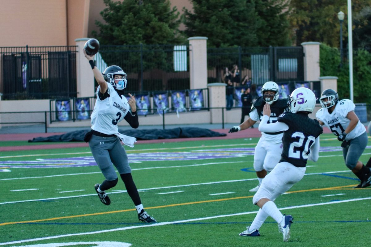 Sophomore quarterback Brody Zirelli lines up a pass downfield, narrowly avoiding defenders in the process. While this drive would not lead to any points, the Scots relied on throws and hand-offs from Zirelli throughout the game. Zirelli also was the holder for Carlmont on field goals and extra points. 