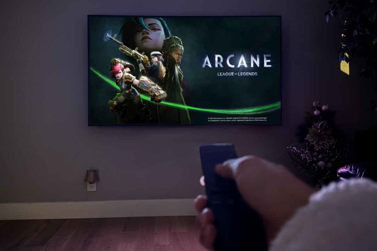 A watcher plays Season 2 of "Arcane" on their TV. "I noticed that characters have developed and significantly changed in Season 2 of 'Arcane' since Season 1. This can create predictions and theories amongst watchers," said Lena Hui, a sophomore at Carlmont High School.