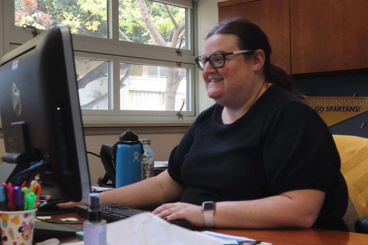 Stephanie Jacobvitz works at her desk, sending emails to students. Jacobvitz focuses on helping students align their career choices with their personal interests and learning styles.