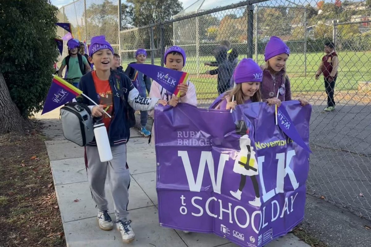 Students from Arroyo School walk and roll to school in honor of Ruby Bridges' contributions to racial equality, wearing purple to represent the Ruby Bridges Foundation. Bridges is one of the most well-known activists of the Civil Rights Movement and was also one of the first advocates for women’s rights. 