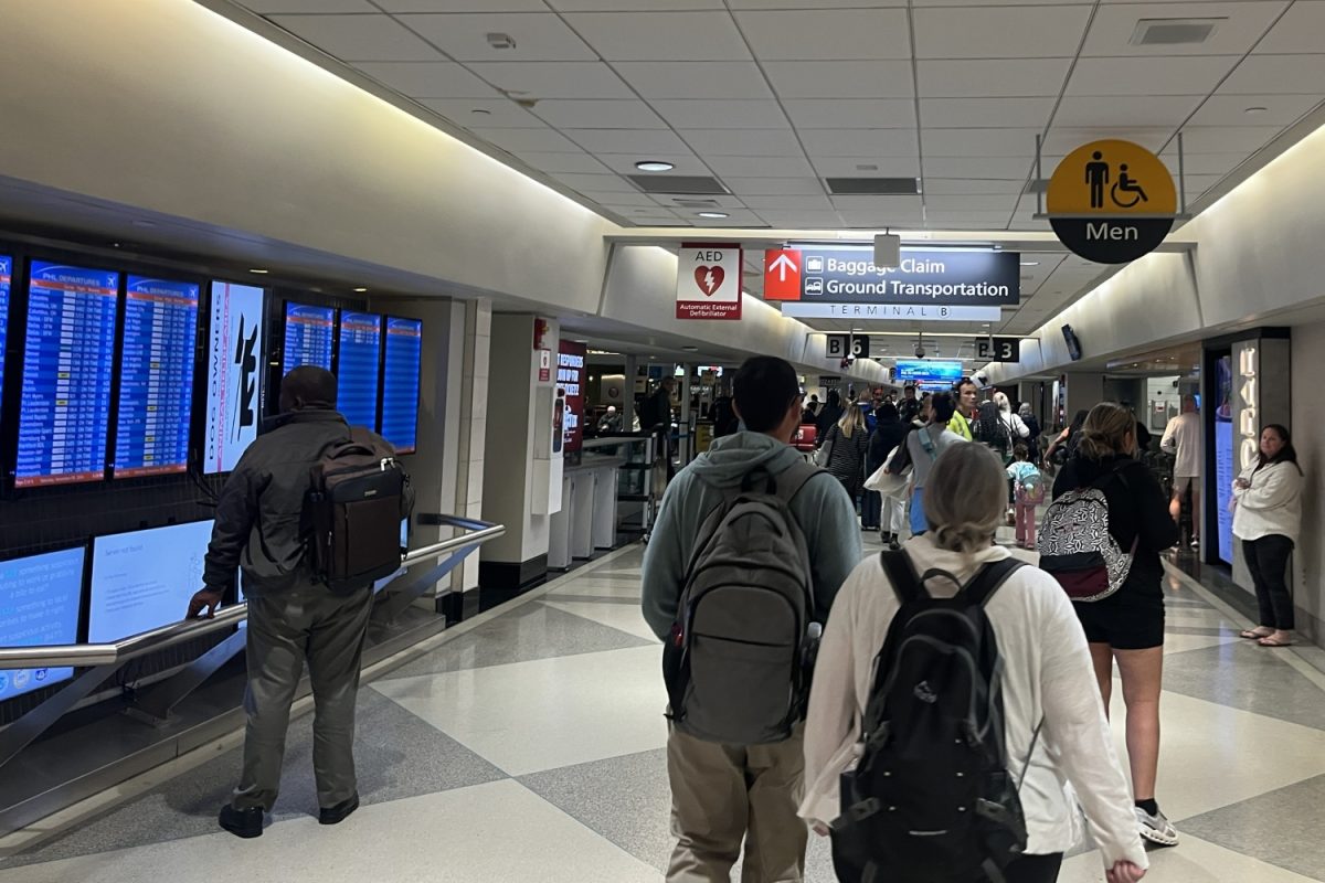 A person checks the dashboard for flight statuses at a busy terminal in Philidelphia International Airport (PHL). In 2023, about 21% of all flights in the U.S. were delayed or cancelled, according to the Bureau of Transportation; many consumers tend to walk away without a rightful refund. With the arrival of this new federal policy, consumers can expect to be compensated when their flights are delayed or significantly cancelled. 