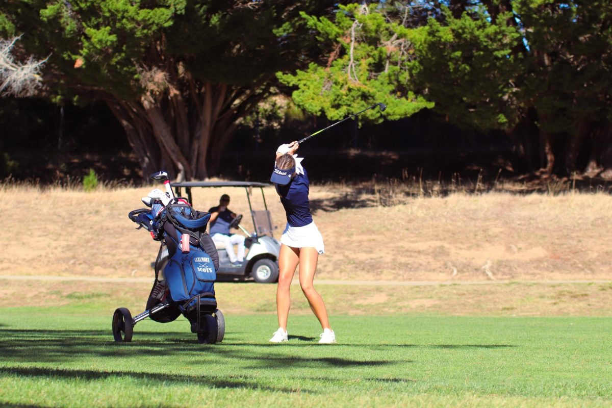 Molholm hits her second shot on the second hole. This shot set her up nicely for a chance at par. The challenge when hitting these shots is to keep the ball on the green and make sure that it doesn't roll off.