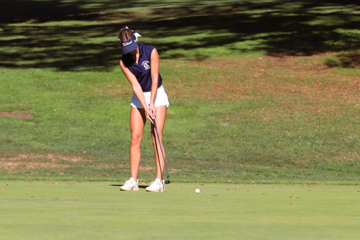 Molholm hits her second shot on a par-3 hole. Due to a great tee shot she had a short putt for birdie. Putting is the most important part of the game to keeping your score low.