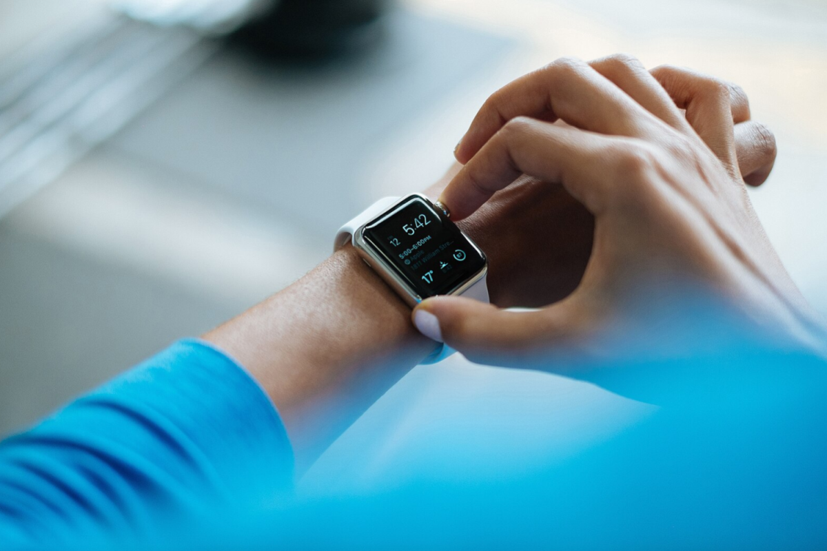 A person navigates their smartwatch, utilizing its different functions. The use of such devices in classrooms has become a debate among teachers and students of whether or not they are a diversion to students' learning.