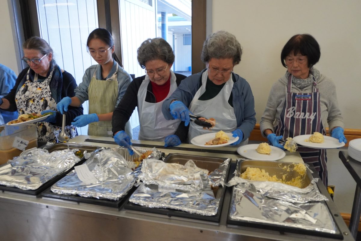 Volunteers at Samaritan House serve fresh food to the community. "I attended this in-person event and I really appreciated the amount of feedback we got from the community. Most people appreciated the work we were doing, especially those who find it hard to provide for their families during this time," said Jessica Harders, Vice President of Advancement at Samaritan House. 