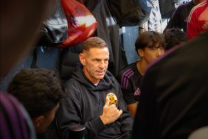 Zak Ibsen leads a team discussion, giving his advice to young athletes right before a high-level soccer game. A former professional soccer player and Olympian, Ibsen now uses his experience to mentor the next generation in MLS Next, the top level of U.S. youth soccer. “Part of his role as a coach is to develop the whole person, not just the player. Zak does a great job of helping kids learn from situations, whether they’re good or bad, and believes failure is a good chance to learn a lesson,” said Andrew Ziemer, one of Ibsen's coaching assistants.