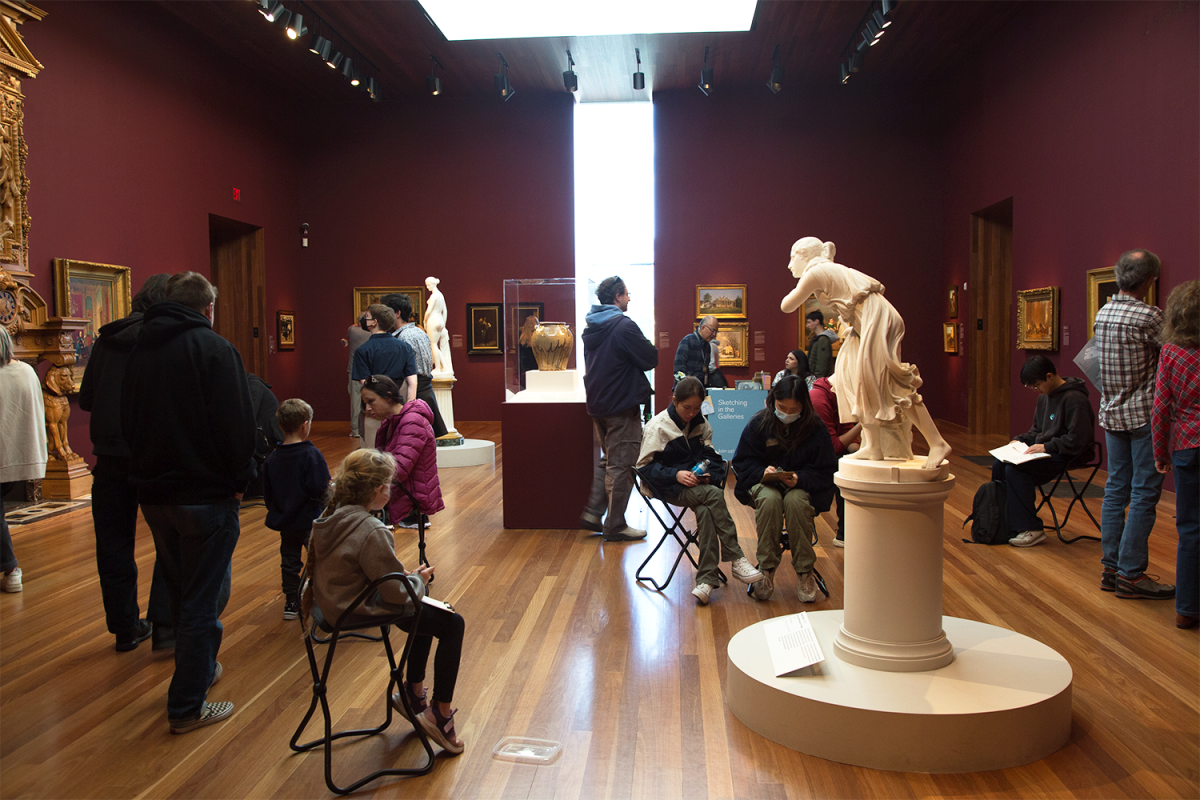 Visitors observe and sketch museum artwork during the de Young Museum's Sketching in the Galleries event on Nov. 30 in Gallery 23, which features American art. The museum's last three gallery sketching events of 2024 will take place on Dec. 7, Dec. 21, and Dec. 28 in three other galleries.