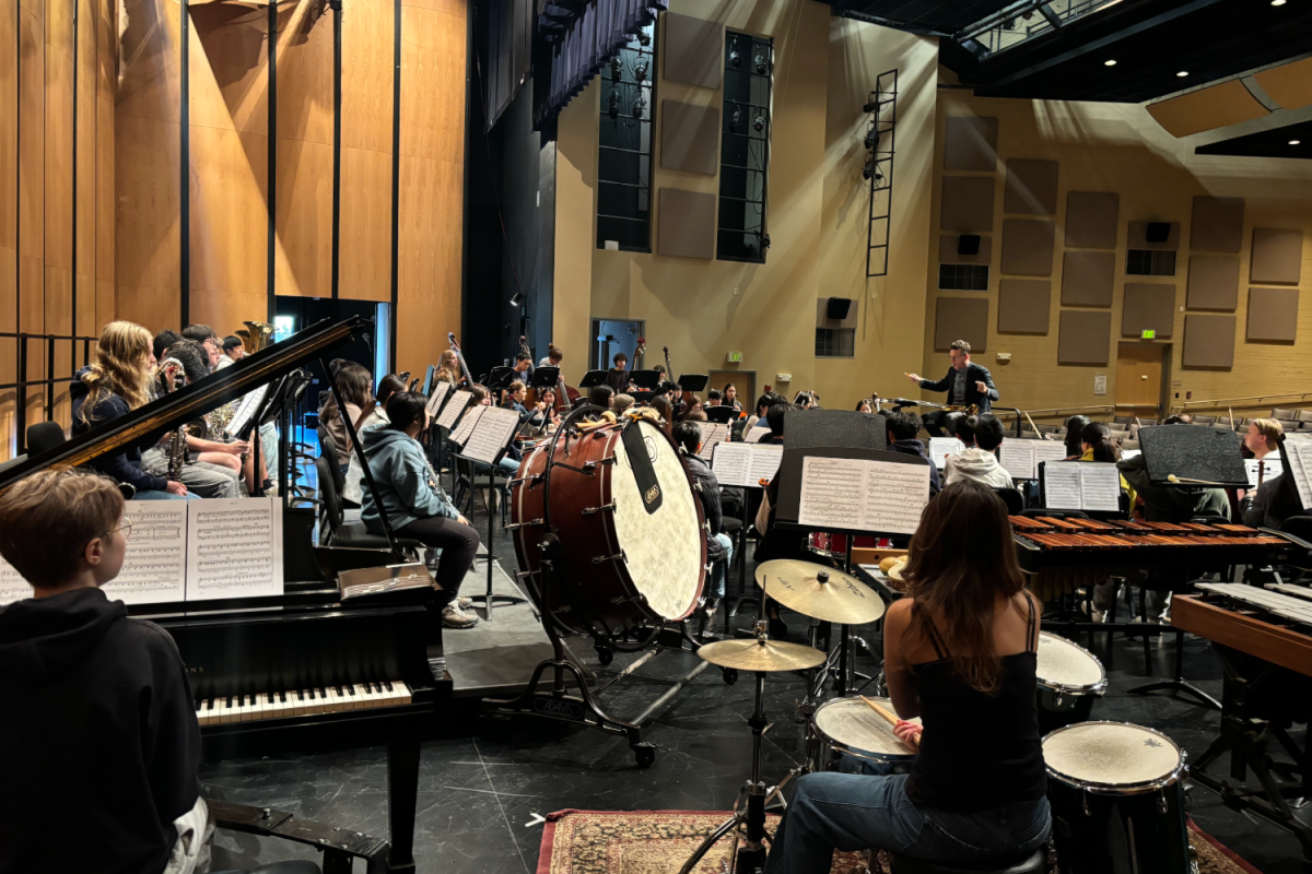 Carlmont music director, Brian Switzer, keeps the Carlmont Symphony Orchestra practicing until the songs are perfected. "Mr. Switzer worked with us quite a bit stylistically on the jazzier piece," said Paige Crowther, a senior at Carlmont.