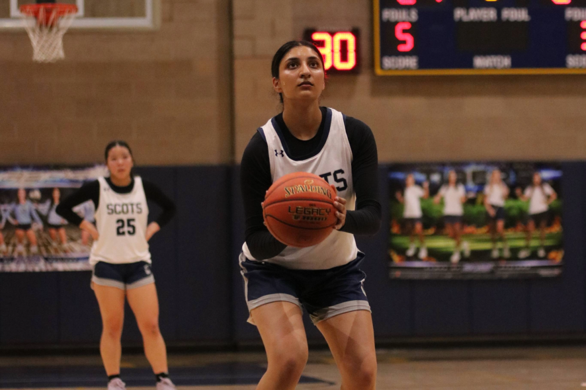 Senior Mischa Duggal steps up to the line to knock down some free throws. She drove to the basket and was able to draw a foul on the shot. Free throws are important shots in basketball that can help get the team easy points.