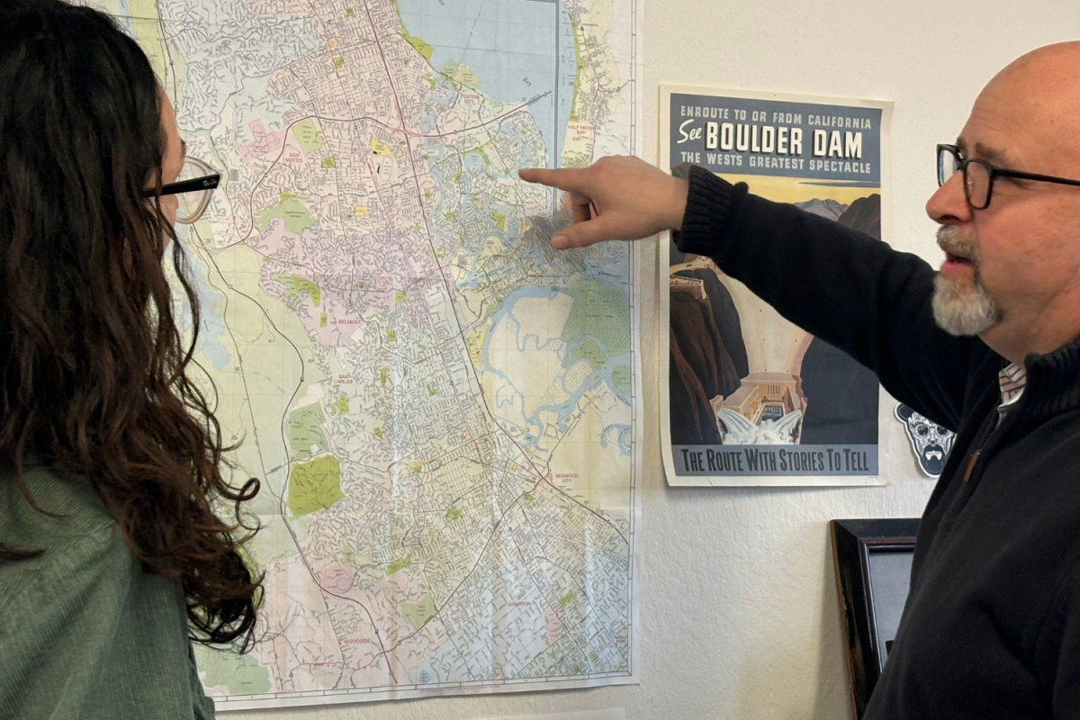 Editor-in-chief Jon Mays discusses salt ponds in Redwood City and Foster City for a reporter’s upcoming news story. Mays writes and edits for the San Mateo Daily Journal, which has had a “pretty consistent audience that has grown over time,” according to Mays. 