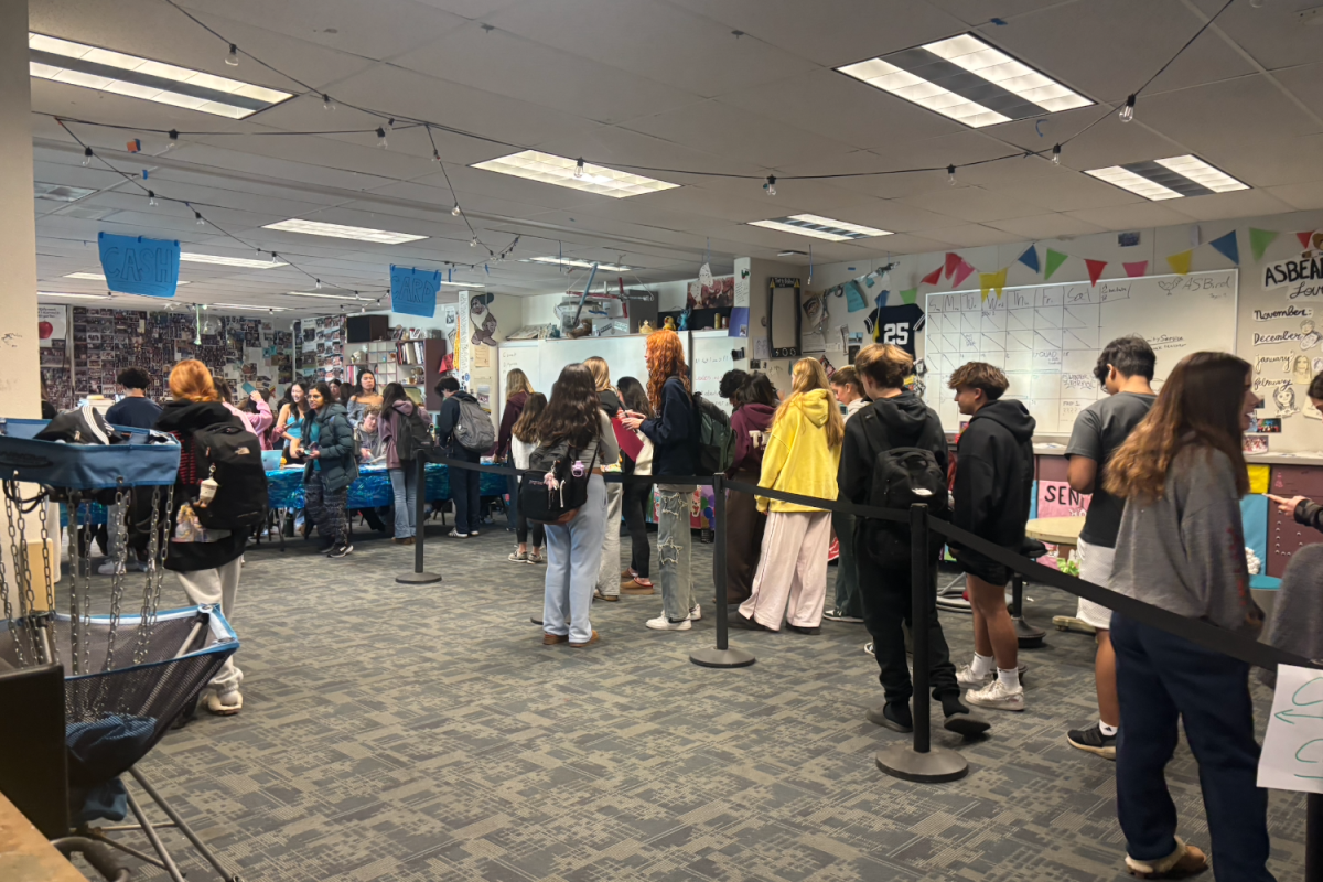 The line for winter formal tickets stretches across the ASB room as students wait to purchase tickets. “The number of tickets sold for formal have definitely increased over the year,” said James Kelly, the ASB director.