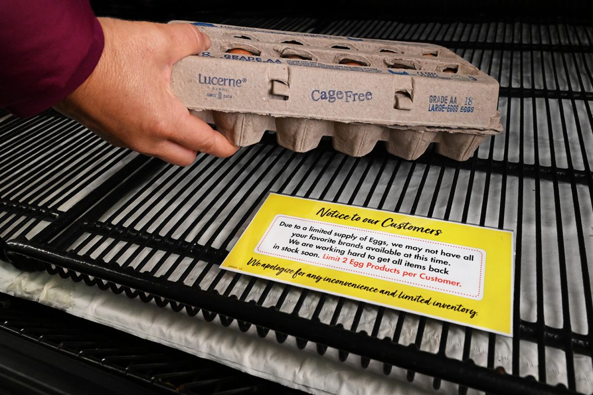 A customer grabs the last carton of eggs in the store. With a shortage of eggs, some supermarkets, such as Safeway, are limiting the amount of eggs you can buy at one time. “I feel like we’re back in the pandemic, and eggs are toilet paper. And even though we have eggs at home, we still need to buy eggs anytime we see eggs now,” said Kristin Behling, a customer at Mollie Stones. 