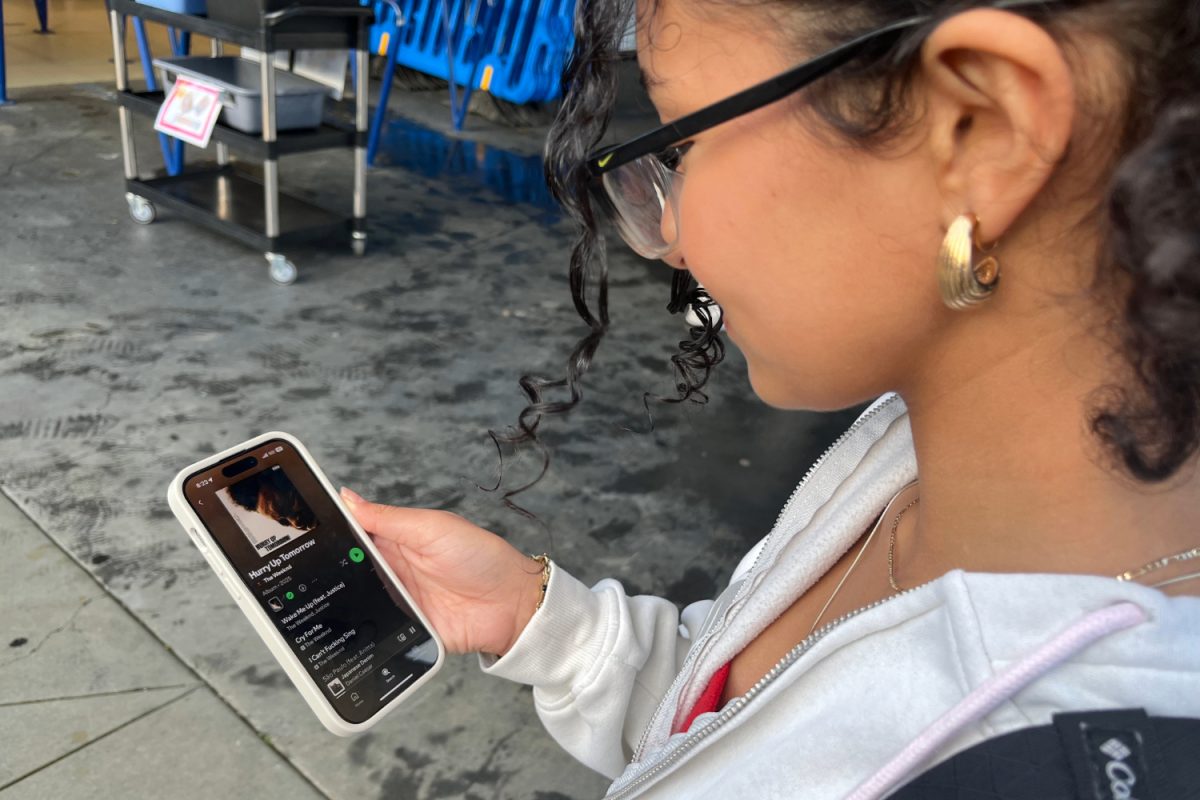 A Carlmont student listens to The Weeknd's "Hurry Up Tomorrow," the album. Having been recently released, this album marks the end of The Weeknd's musical career, and was accompanied by the announcement of his final tour.