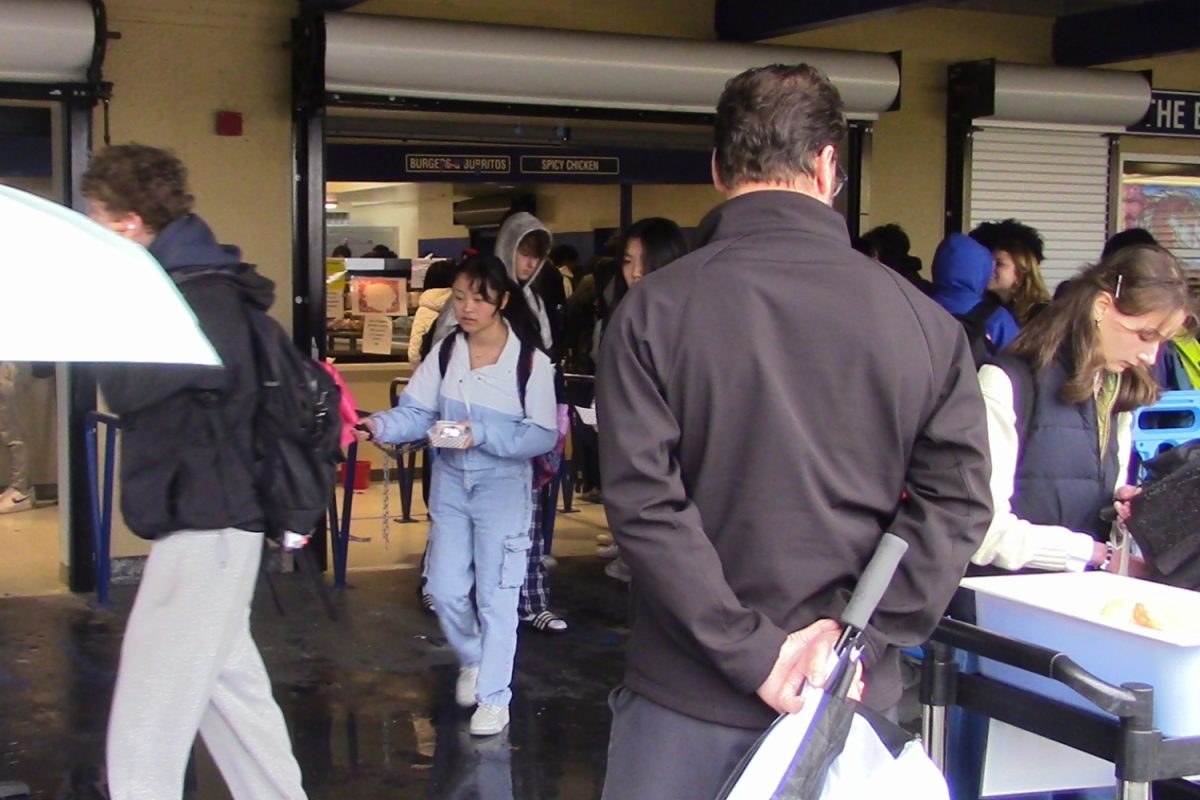 Gregg Patner, administrative vice principal, watches over the cafeteria every day. He ensures students are safe during lunch. His dedication to the school is evident through actions like these.