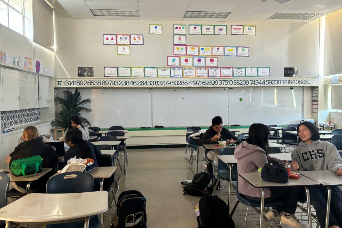 Students in the Naptime Club eat their lunch and catch up with their friends in a calm environment. "Other clubs that I attended are really rowdy and noisy," said Jaysie Ho, the president of the club. "Having the blinds closed and the lights off really creates a comfortable atmosphere for the members."