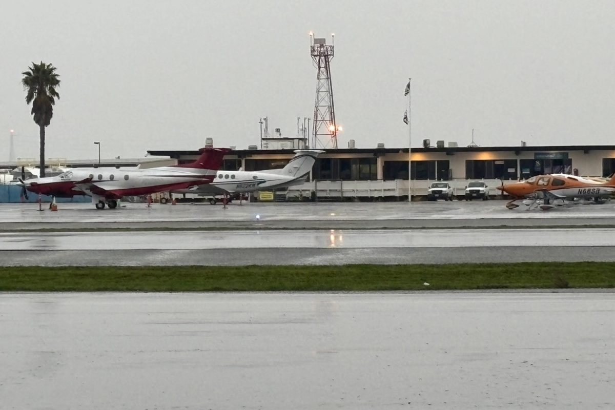 A small jets sit outside of the main building of San Carlos Airport (SQL). Many of the flights at SQL are general aviation, while others use jets for commercial purposes.