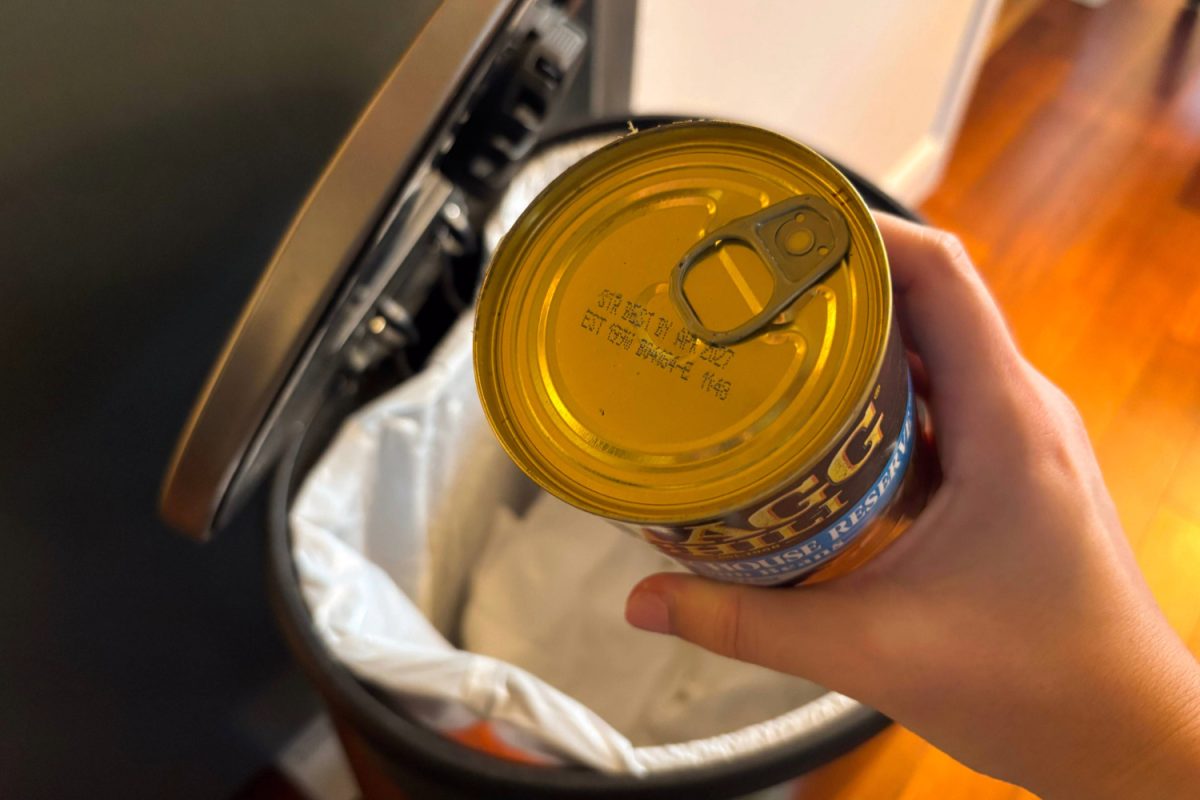 A consumer trashes a can of chili that’s past its expiration date. The majority of food waste comes from food tossed due to date of label concerns and confusion; however, the end result poses challenges for both the environment and the economy. “One of the easiest ways that you can fight climate change is by eating the food you already have. We have agency in tackling what can be a scary problem,” said Selena Mao, a research manager at ReFED.