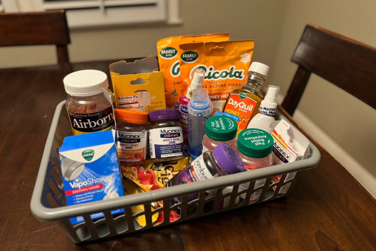 A box of medications and cold remedies sits in a student's house. "My 'medicine bag' for the common cold or respiratory illness is lots of rest, fluids, supplements, and decongestants," Karen Molinari said.