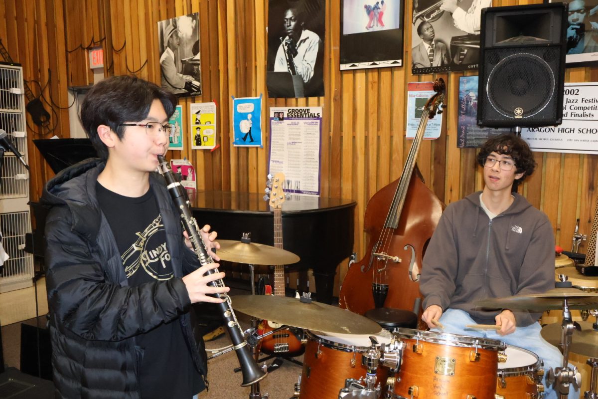 Tokunaga makes eye contact with drummer Gabriel Haller while he is improvising. They need to interact to stay together in the music.