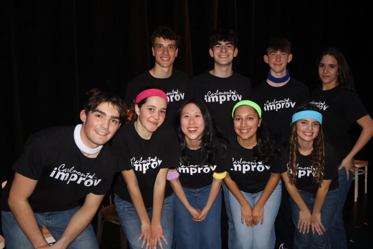 The Carlmont Improv Team poses for a group photo after their performance. They had just performed in their Winter Improv Show.