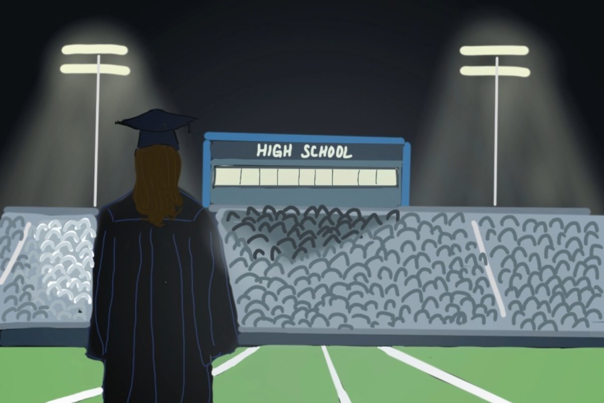 A high school graduate watches a football game from the sidelines. With 3.1 million homeschooled students in 2022, homeschooling is on the rise in the U.S., according to the Legislative Research Commission.