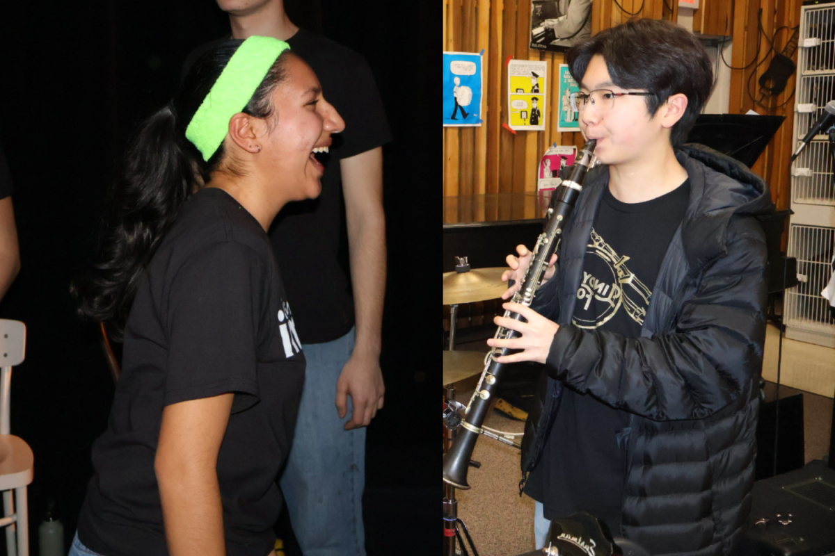 Asha Mehta, a member of Carlmont Improv, laughs to the side of a jazz clarinetist. They are both improvising in different ways.