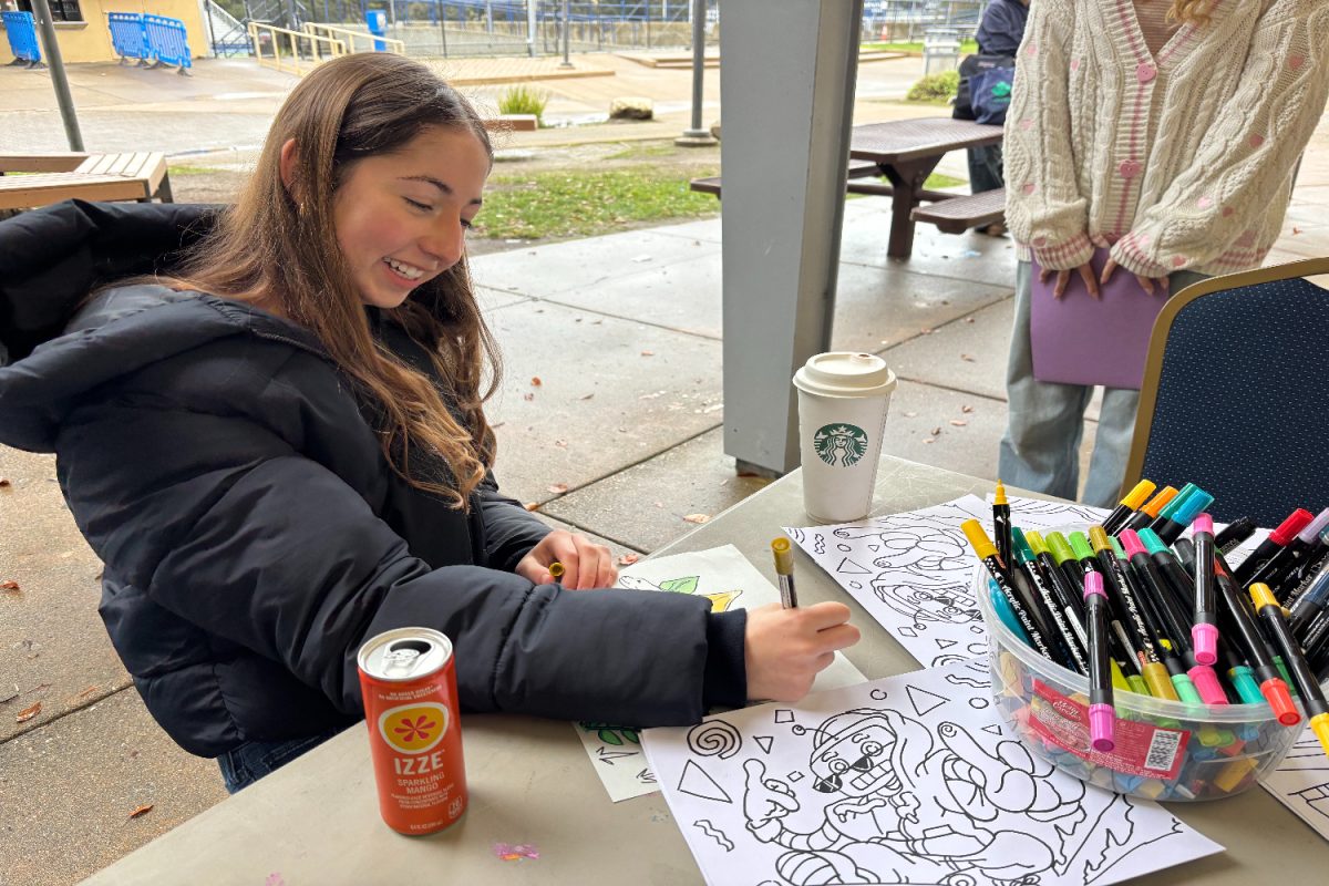 An ASB applicant waits for her interview, participating in one of the provided activities, coloring. During ASB interviews, some applicants have to wait before their interview, due to other interviews running late or the evaluation of other applicants.