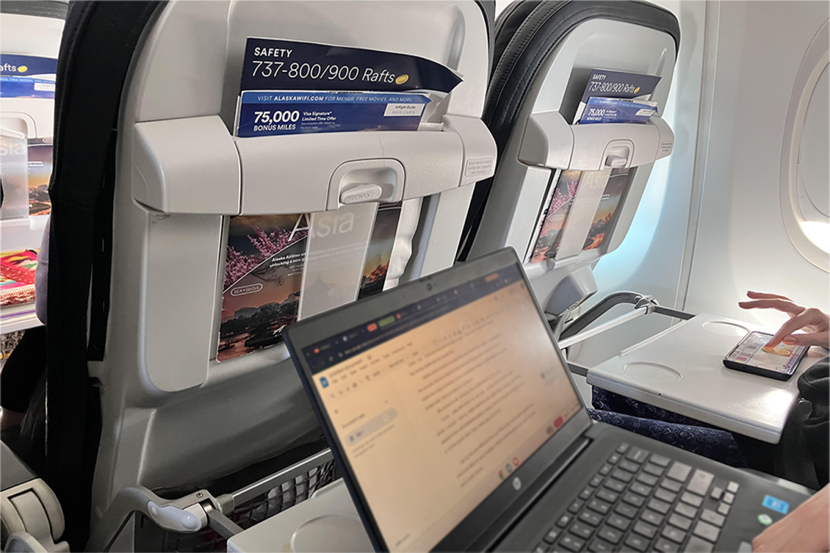 Carlmont student Harper Lee works on English homework on a flight to New York. Passing the time and getting work done at once is one way to take advantage of long flights.