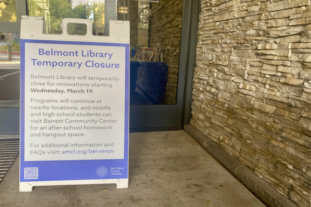 A sign outside the Belmont Library shows when it will close and where visitors can go while it is closed for the next few months. Many students from schools nearby often go to the library as a place to relax and study.