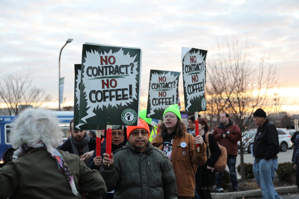 Starbucks baristas hold up signs and march in protest at a picket rally in Chicago. Many Starbucks stores have gone on strike for better pay, hours, and working conditions. “This strike makes me see Starbucks as very capitalist, and maybe they just don't have the best care for their employees," said Hailey Zhao, a sophomore at Carlmont High School. "Starbucks is a really big brand, and you assume that their treatment of workers is good, but clearly it’s not."
