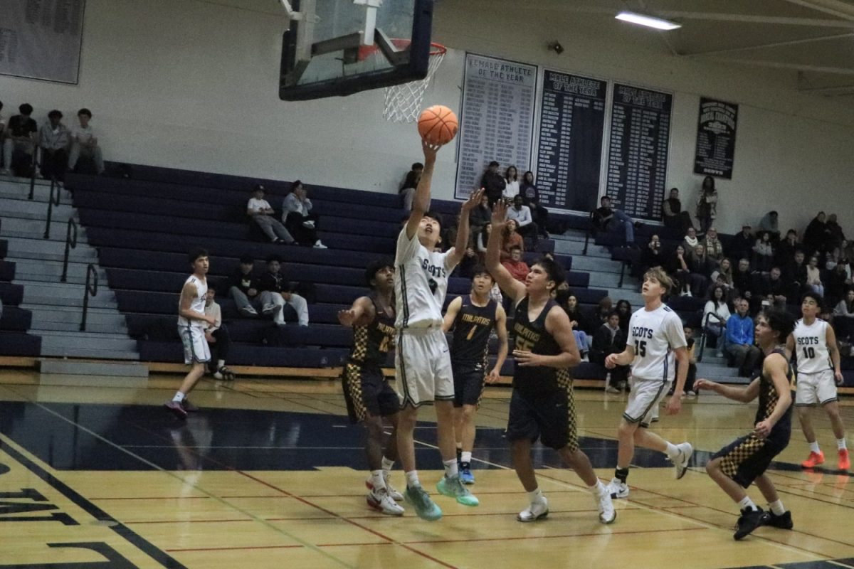 Carlmont sophomore Richard Dong goes in for a lay-up. The lay-up went in, and the Scots were awarded two points. "This win definitely gives us confidence going into the next few games," Rozenfeld said.