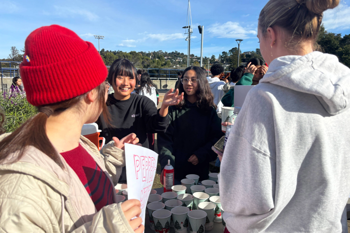 Christians in Action Club sells hot chocolate to students at the Winter Club Fair. This club fair allowed many cultural and religious clubs the opportunity to engage with members of the Carlmont High School community who relate to or are curious about their club.