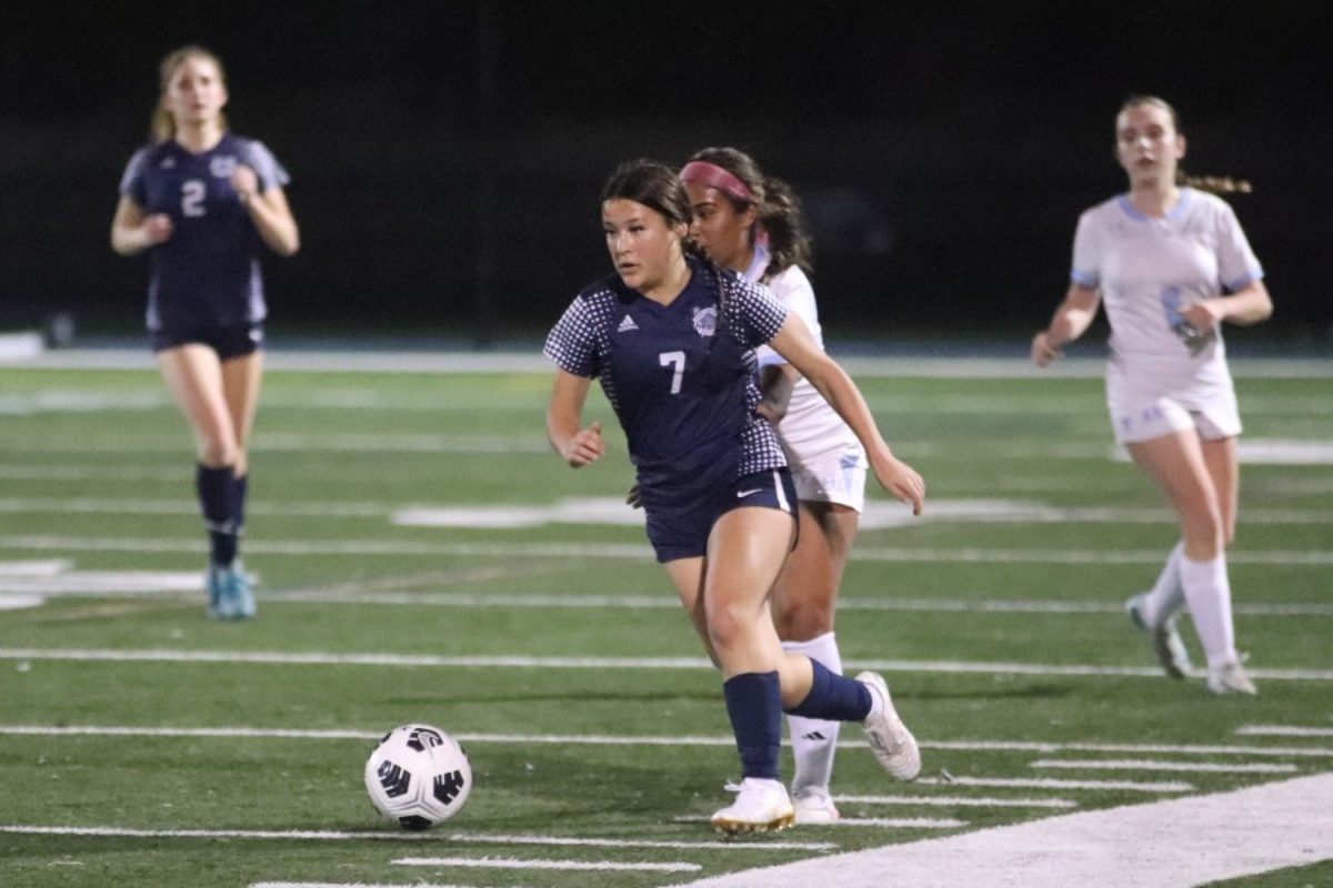 Sophomore Zoey Toyozumi dribbles past defenders. She cleared many balls up the field, putting pressure on the Knights and giving opportunities for the Scots. Toyozumi was incredibly focused both halves of the game.