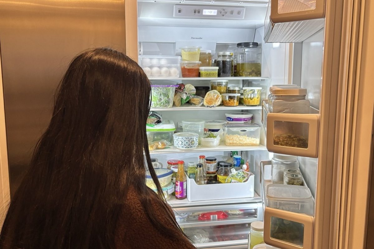 After school, a teenager scans her fridge, weighing whether to grab a snack or cook something herself. Many students avoid cooking because it feels time-consuming, they aren’t confident in their skills, or grabbing ready-made food simply seems faster and easier after a long school day.