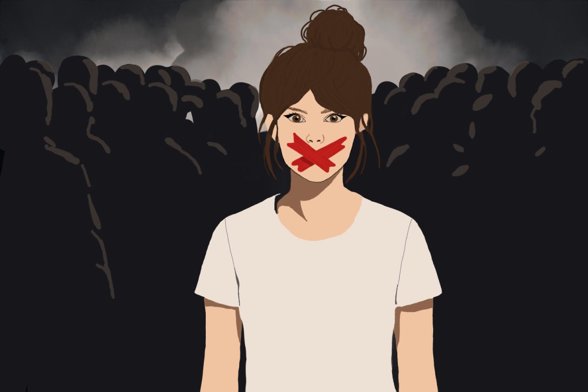 A student stands with red tape over her mouth as a crowd gathers behind her, representing the silence many students experience during classroom discussions. A classroom observation study published in the multi-disciplinary journal Behaviour Research and Therapy found that students with higher social anxiety were treated more negatively by classmates during oral presentations. 
