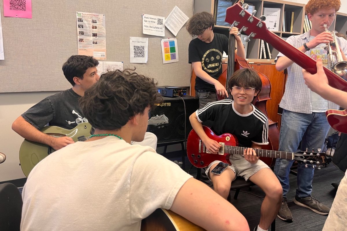 Seoha Kim, a senior at Carlmont High School performing at Chamber Music Night, practices his piece with his friends and ensemble. "Performing with your friends and community is the most memorable thing," Kim said. 
