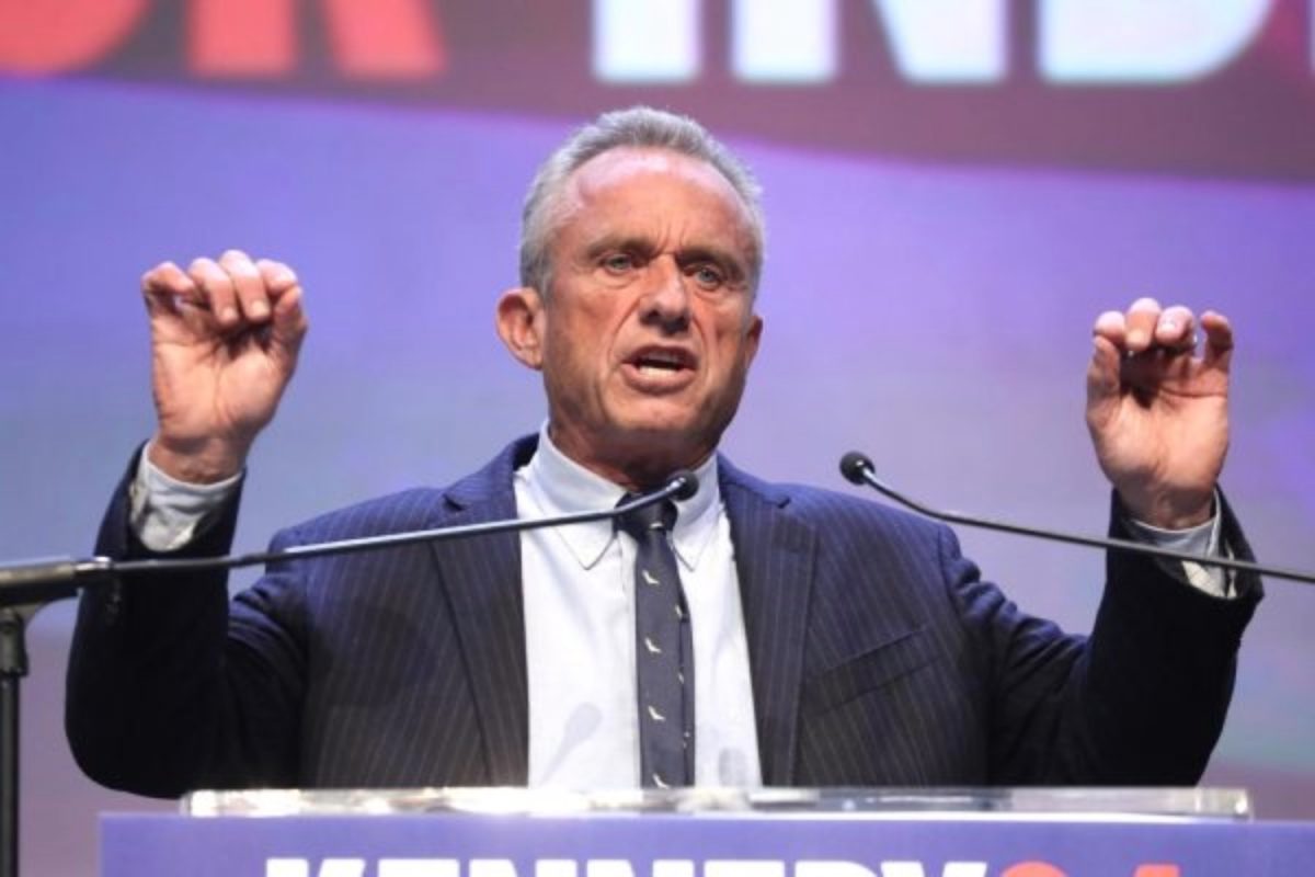 U.S. Health and Human Services (HHS) Secretary Robert F. Kennedy, Jr. speaking with supporters at a campaign rally at the Fox Tucson Theatre in Tucson, Arizona. Inaction in regulating food and drink consumption despite running on the campaign of "Make America Healthy Again" marks one of the issues with the current U.S. regulatory "free-market" stance.